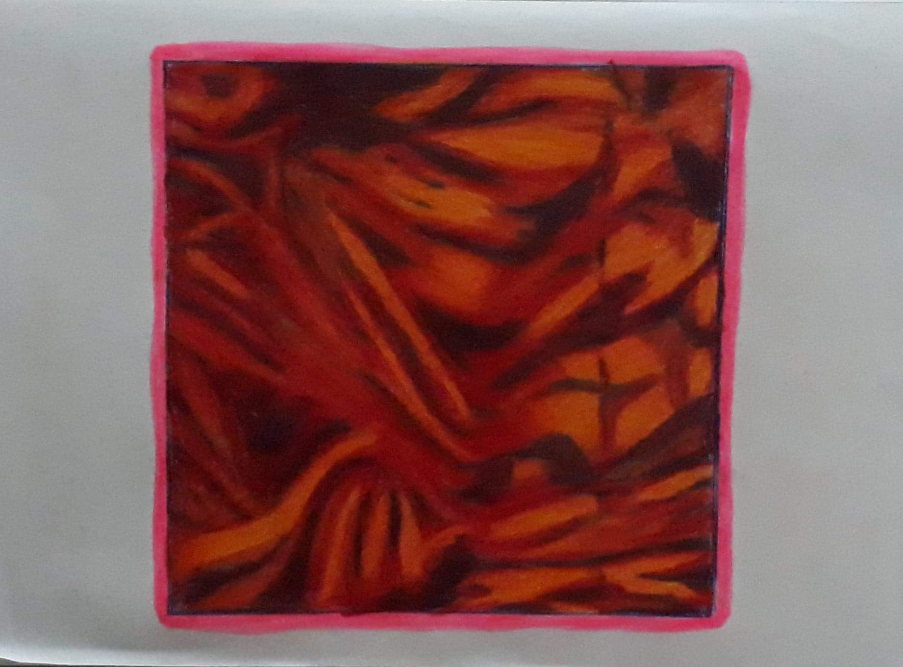 Painted orange and red section from a collaborative class exercise.