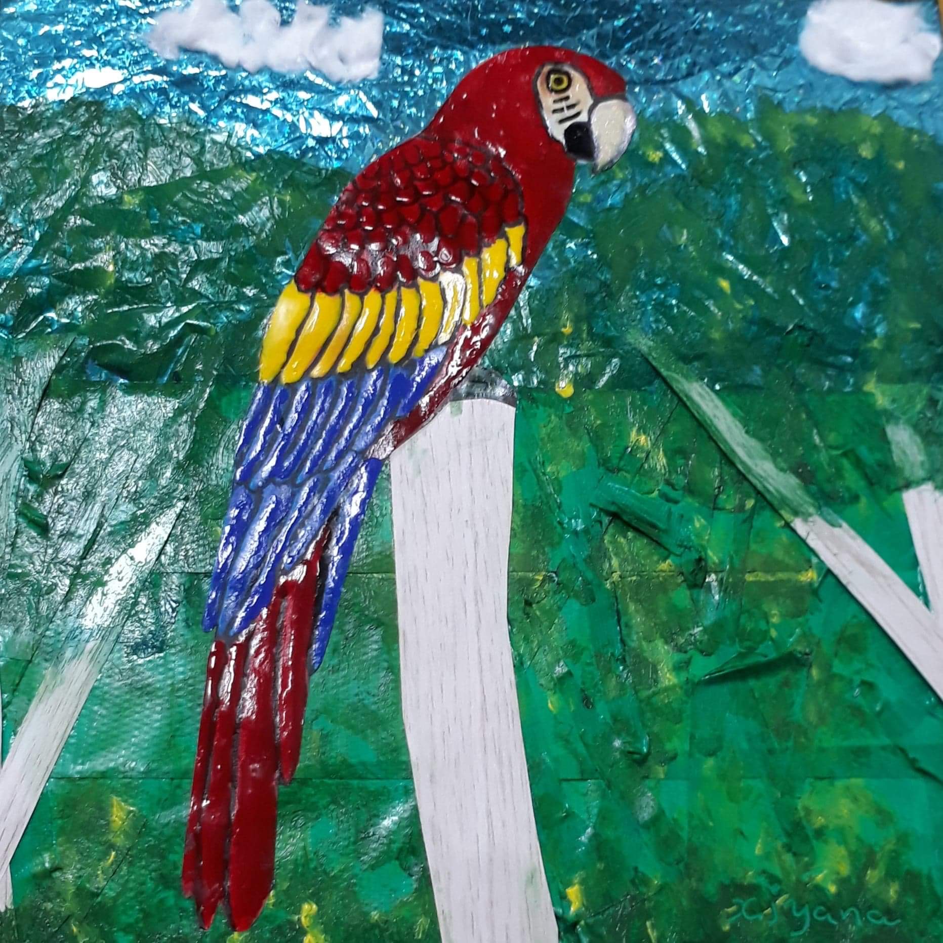 Colorful macaw artwork in a forest setting.